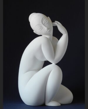Nude female sitting